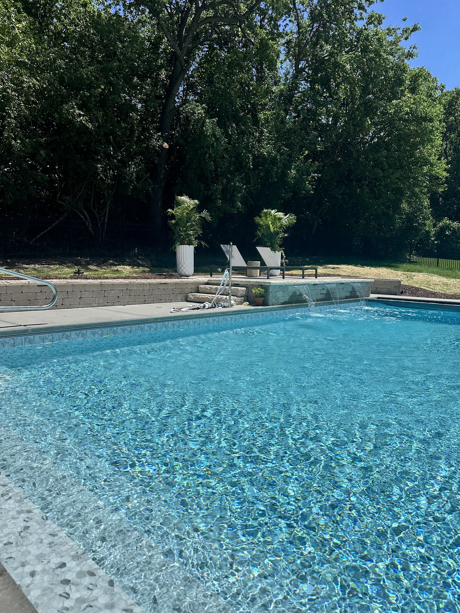 Resort-Style Pool with Waterfall Feature